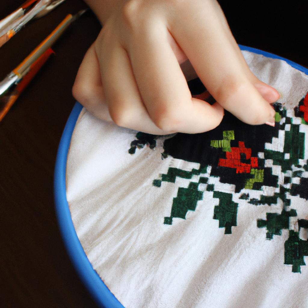 Person cross stitching and designing