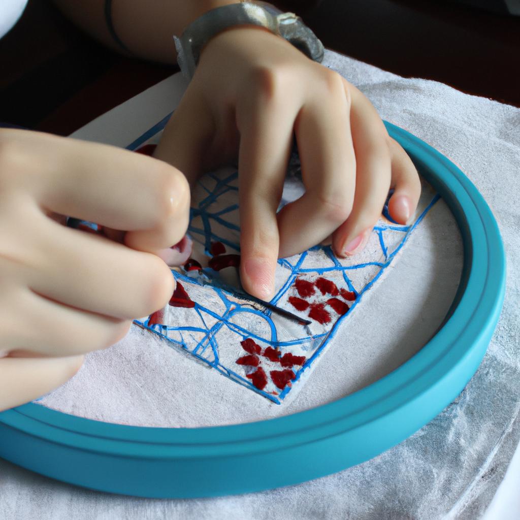 Person stitching cross stitch design